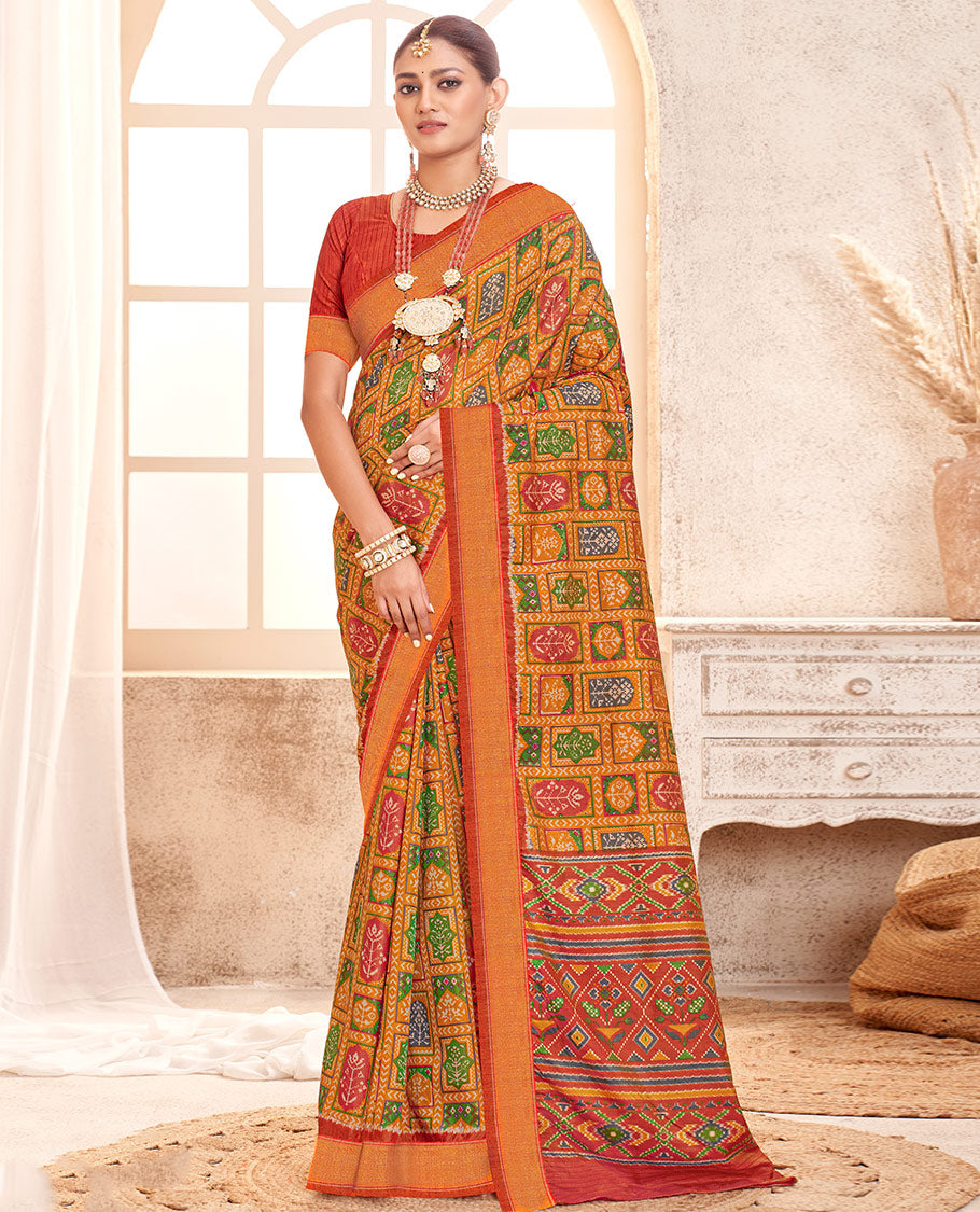 Orange Patola Fancy Raw Silk Designer Saree, Adorned with Intricate Design, a Bavanji Border, Intricately Designed Pallu, and a Contrast Blouse