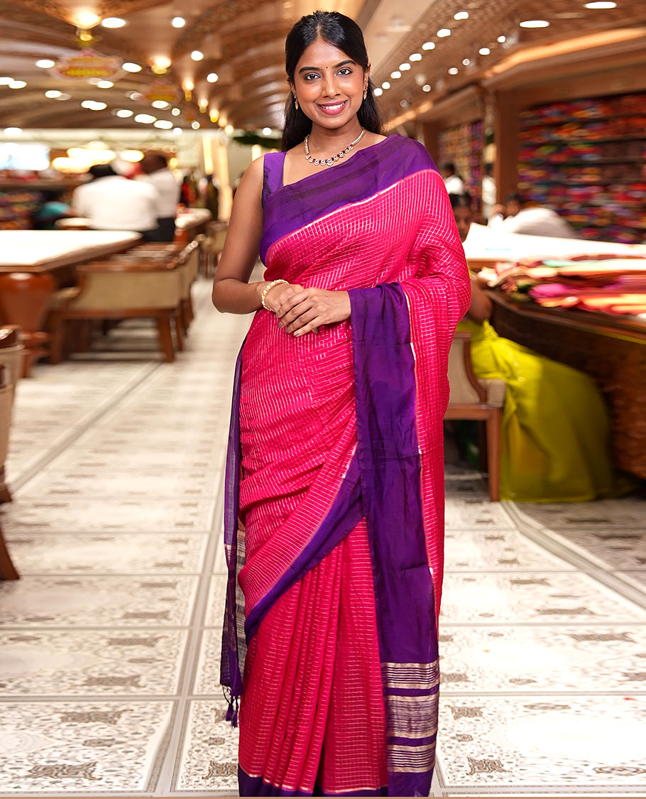 Pink Assam Silk Saree, Gleamed Up with Zari Checked Design on Its Body, Complemented by Contrast Border, Pallu Steeped with Gleaming Zari Stripes, and Paired with a Contrast Blouse