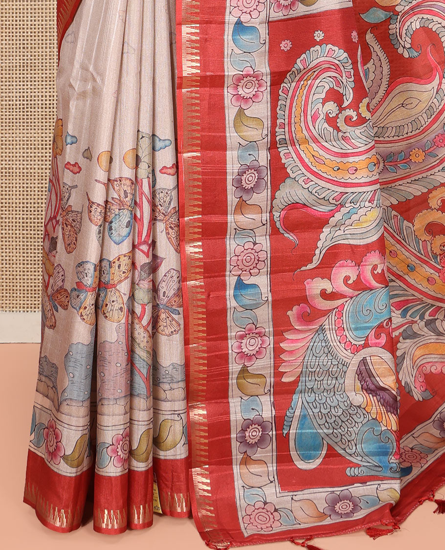 Chikku-Red Fancy Tussar Saree, Artfully Detailed with Kalamkari-Style Floral Print Across Its Body, Complemented by Contrast Temple Zari Border, a Colourfully Kalamkari Printed Pallu, and Paired with a Plain Blouse