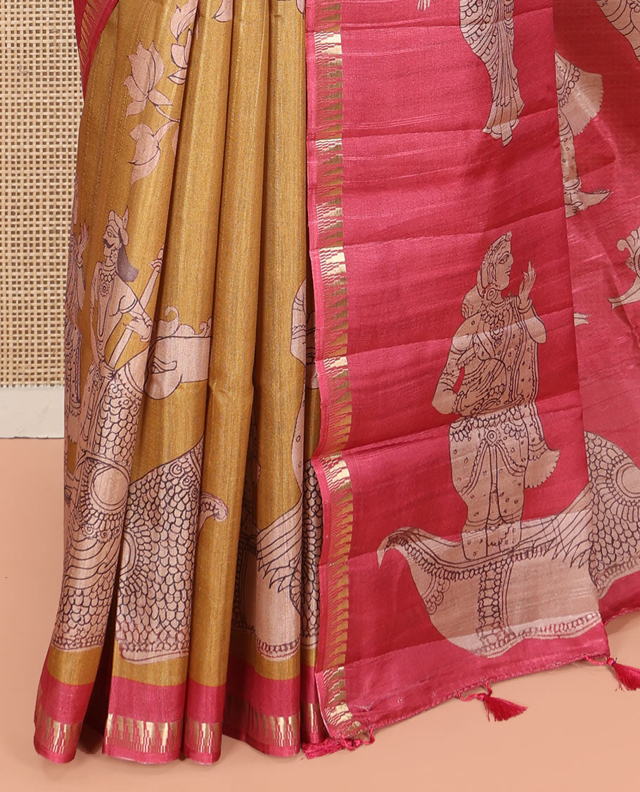 Mustard Semi-Tussar Silk Saree, Elegantly Detailed with Kalamkari-Style Human Motifs Printed on Its Body, Complemented by a Contrast Temple Zari Border, Creatively Kalamkari Printed Pallu, and Paired with a Contrast Blouse