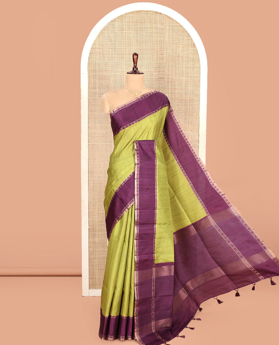 Olive Green Plain Semi-Tussar Silk Saree, Complemented by a Contrast Geometric Design Border, Subtly Zari Striped Pallu, and Paired with a Contrast Patola Printed Blouse