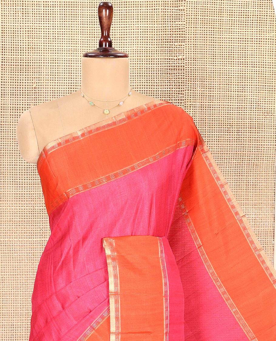Pink Plain Semi-Tussar Silk Saree, Complemented by a Contrast Geometric Design Border, Subtly Zari Striped Pallu, and Paired with a Contrast Patola Printed Blouse
