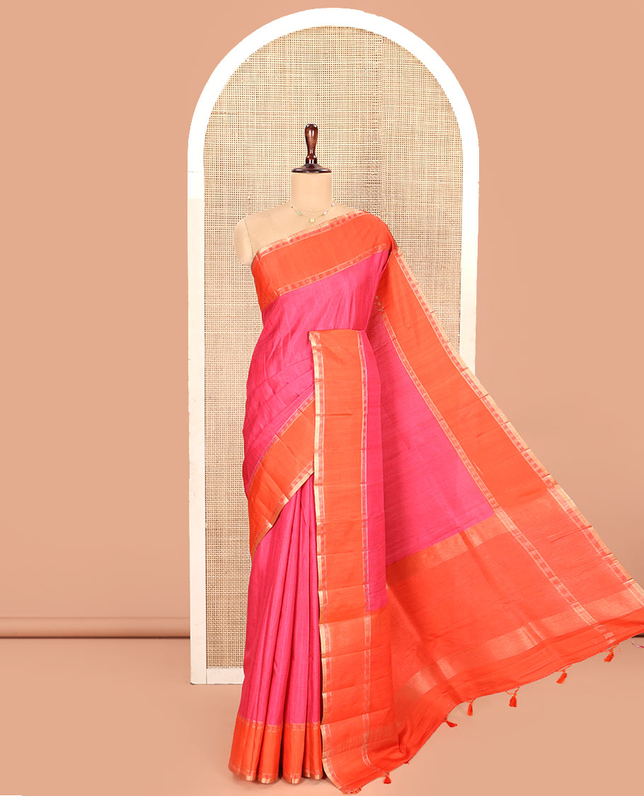 Pink Plain Semi-Tussar Silk Saree, Complemented by a Contrast Geometric Design Border, Subtly Zari Striped Pallu, and Paired with a Contrast Patola Printed Blouse
