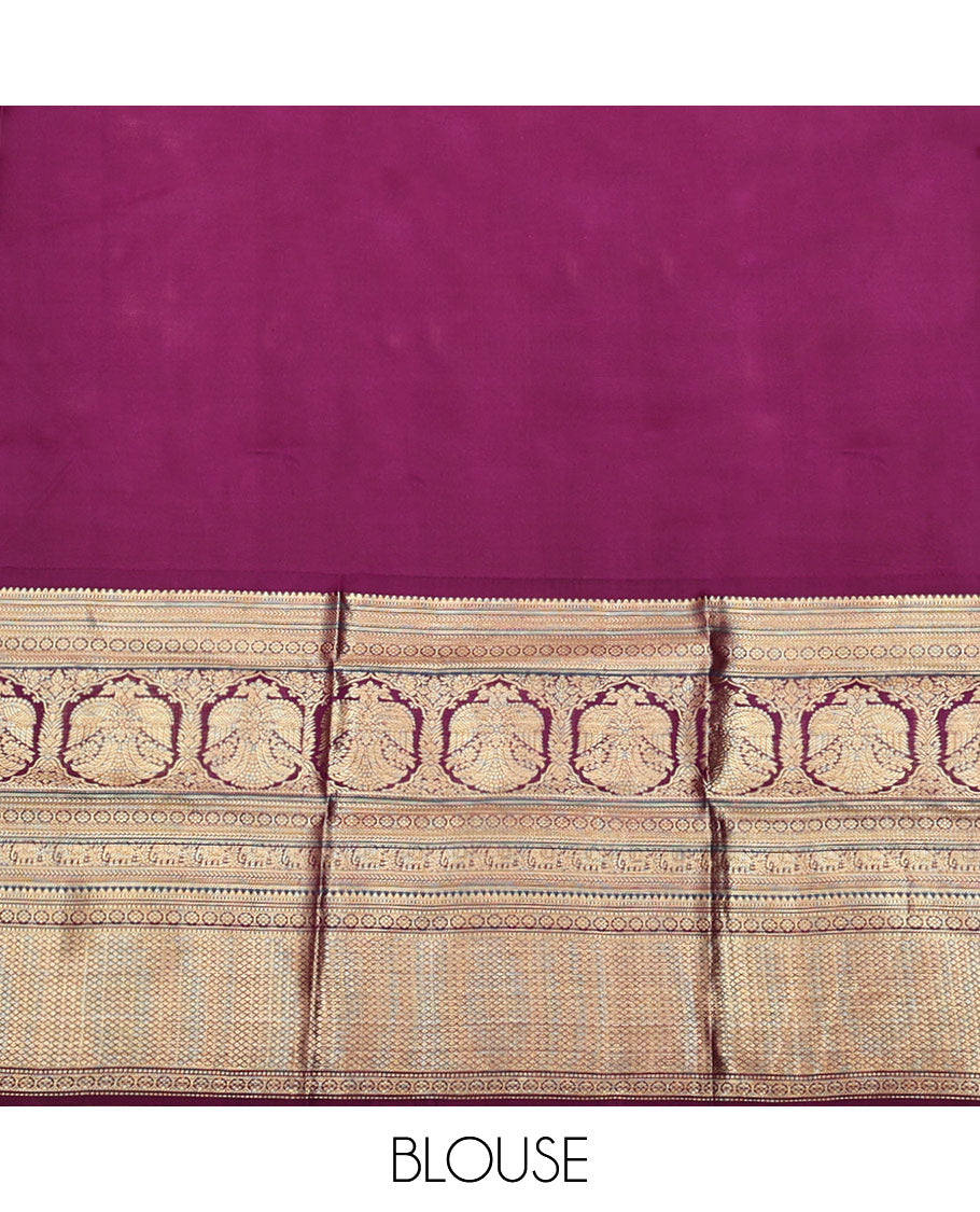 Pink Vasundhara Silk Saree, Elevated with Zari Stripes and Chakram Buttas All Over Its Body, Complemented by a Contrast Border of Rekku, Muthu, Kamalam and Mayil Kann Designs, Grand Geometric Patterned Pallu, and Paired with a Contrast Blouse