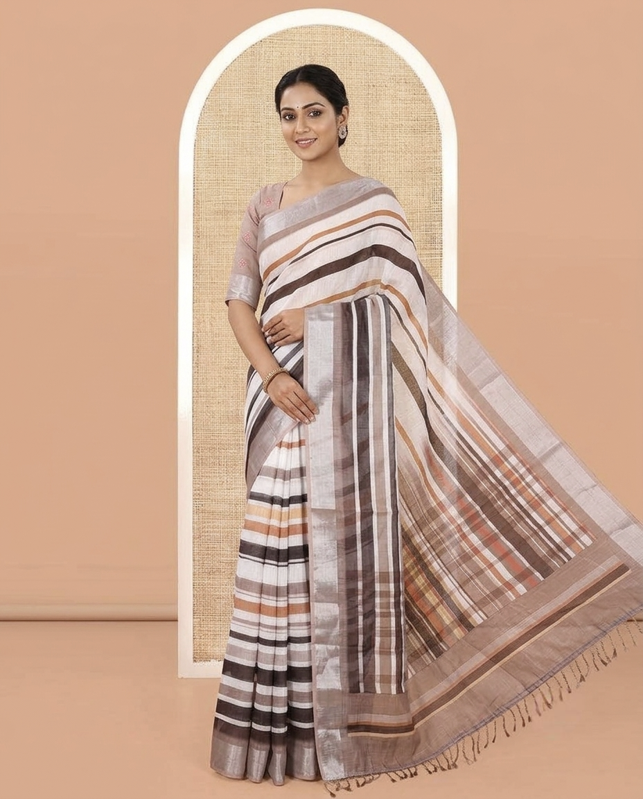 White-Brown Linen Cotton Saree Features Horizontal Stripes on Its Body, Complemented by a Contrast Zari Border, Multi-Color Striped Pallu, and Paired with a Contrast Blouse