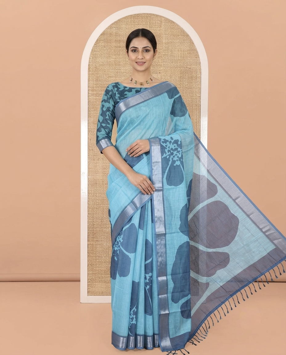 Blue Linen Cotton Saree, Prettified with Floral Print All Over Its Body, Complemented by a Contrast Zari Bavanji Border, Floral Printed Pallu, and Paired with a Matching Blouse