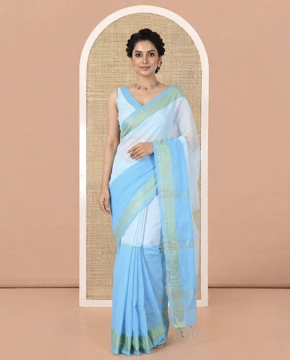 Blue Khadi Mul Cotton Saree, Adorned with Half-And-Half-Style Double-Colour Dyed on Its Body, a Subtle Zari Border, Striped Pallu, and Paired with a Matching Blouse