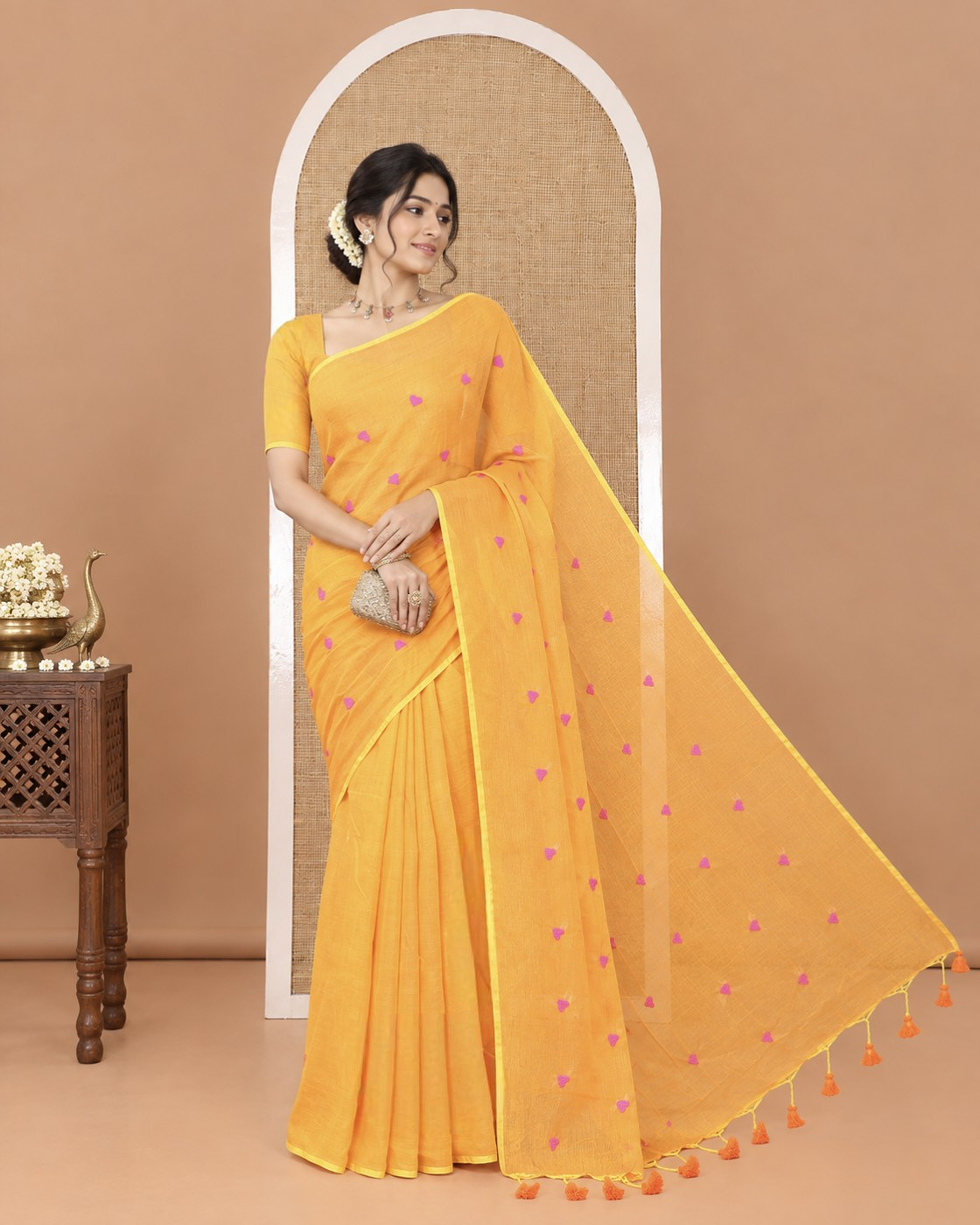 Borderless Orange Khadi Mul Cotton Saree, Artfully Designed with Heart Motifs Embroidery Across Its Body, Pallu mirrors the Same Design, and Paired with a Matching Blouse