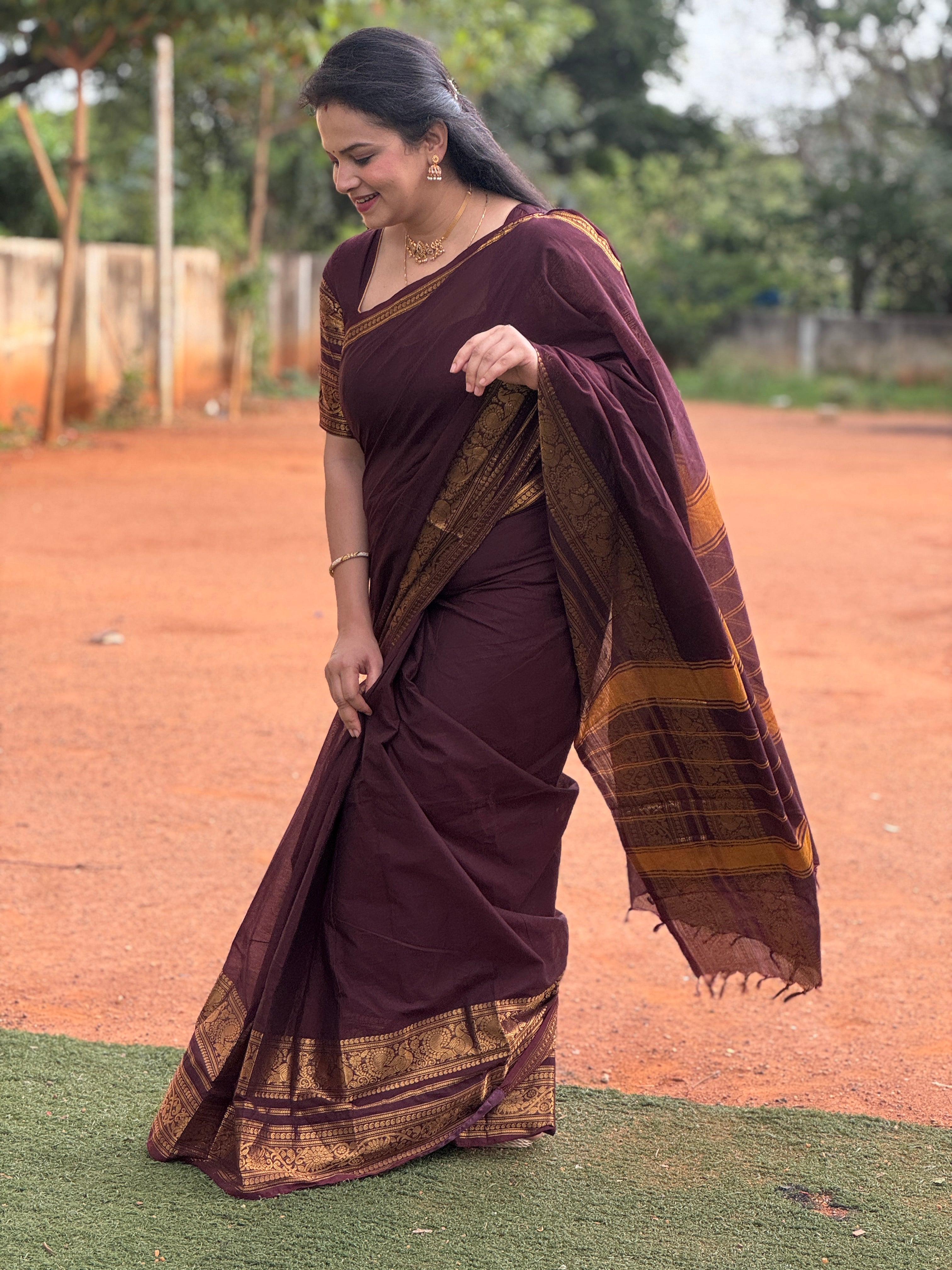 Maroon Plain Chettinad Cotton Saree, Highlighted by Self-Border of Traditional Zari Designs, Subtly Striped Pallu, and Paired with a Matching Blouse