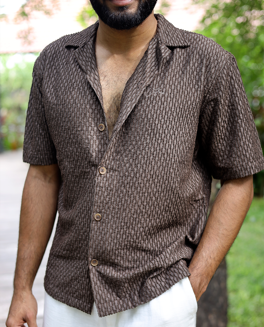 Brown Textured Cotton-Blended Casual Shirt Features Half Sleeves, a Regular Fit, a Spread Collar, and Regular Length