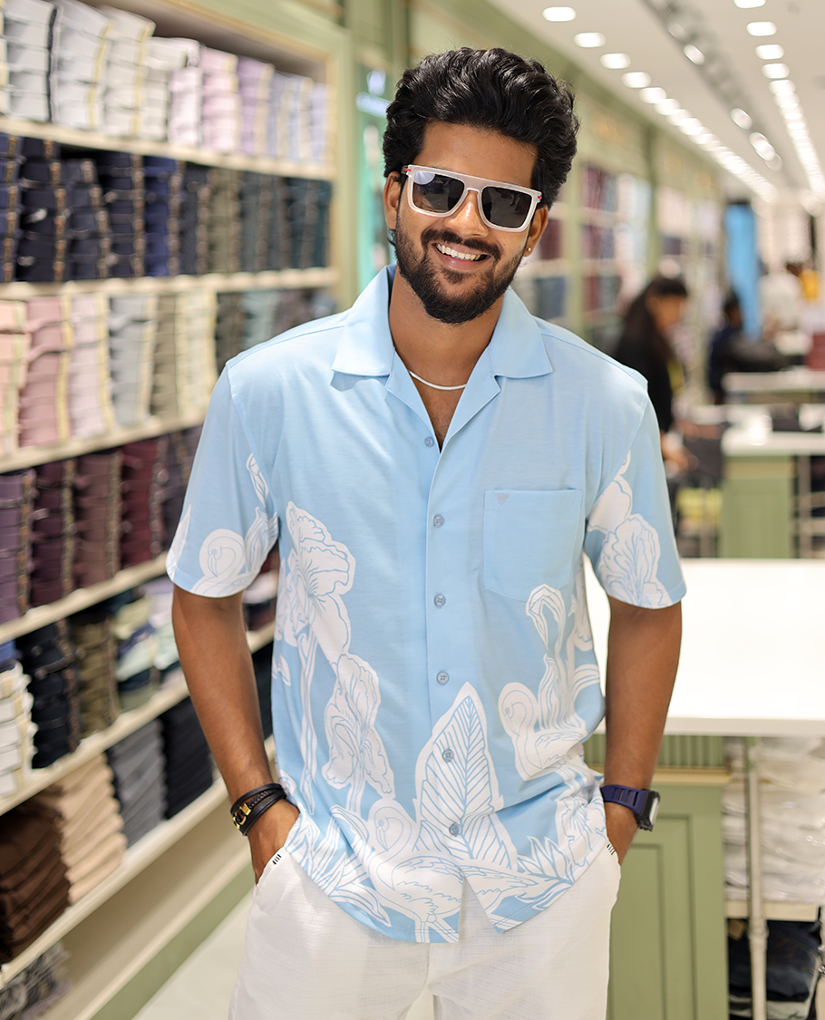 Blue Cotton-Blended Casual Shirt, Adorned with a Floral-Swan Print, Half-Sleeves, Spread Collar, Regular Fit, and Regular Length