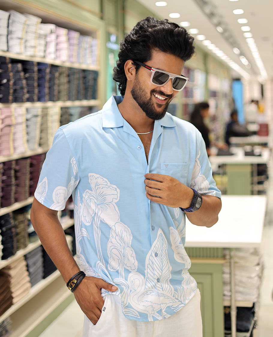 Blue Cotton-Blended Casual Shirt, Adorned with a Floral-Swan Print, Half-Sleeves, Spread Collar, Regular Fit, and Regular Length