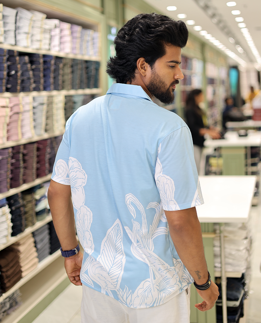 Blue Cotton-Blended Casual Shirt, Adorned with a Floral-Swan Print, Half-Sleeves, Spread Collar, Regular Fit, and Regular Length