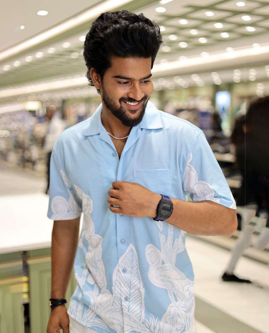 Blue Cotton-Blended Casual Shirt, Adorned with a Floral-Swan Print, Half-Sleeves, Spread Collar, Regular Fit, and Regular Length
