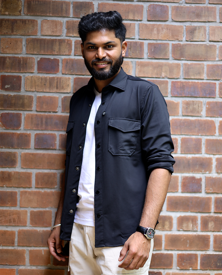 Black Solid Poly-Blended Casual Shirt Featuring Full Sleeves, a Spread Collar, a Slim Fit, and Regular Length