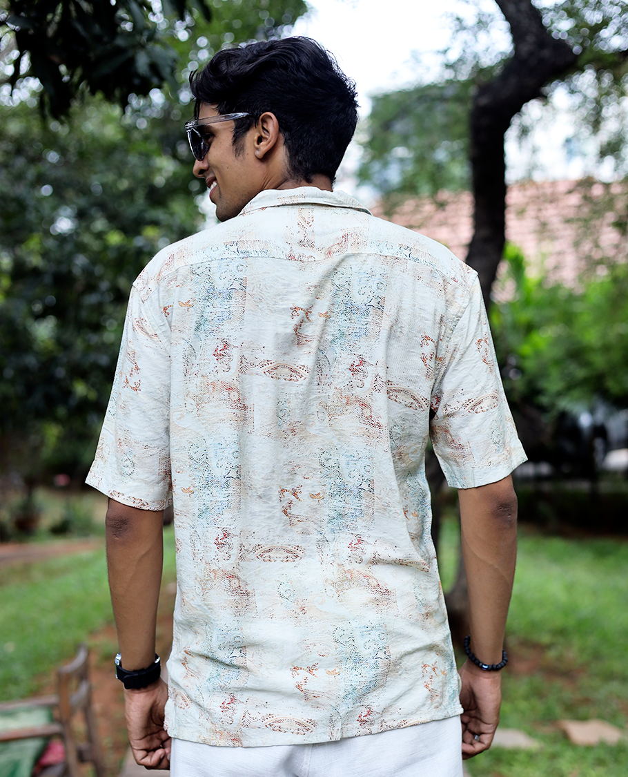 White Cotton-Blended Casual Shirt Adorned with Abstract-Painting-Style Print, Half Sleeves, a Regular Fit, a Cuban Collar, and a Regular Length