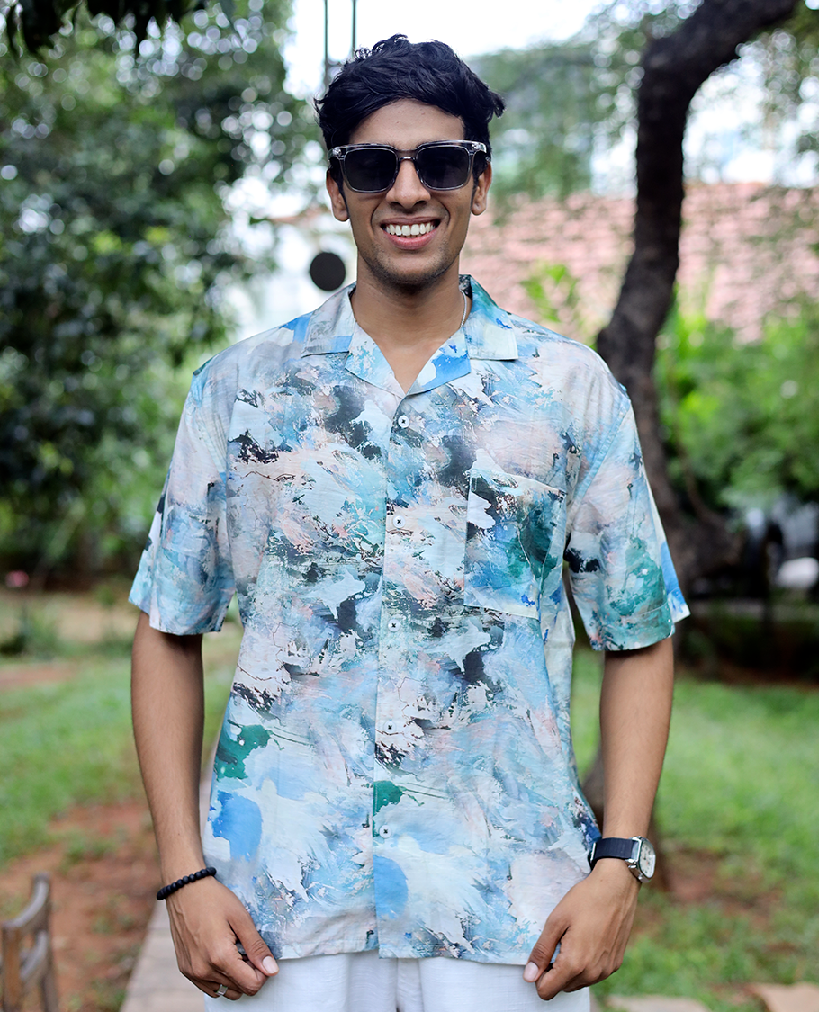 Blue Cotton-Blended Casual Shirt Elevated with Abstract-Painting-Style Print, Half Sleeves, a Regular Fit, a Cuban Collar, and a Regular Length