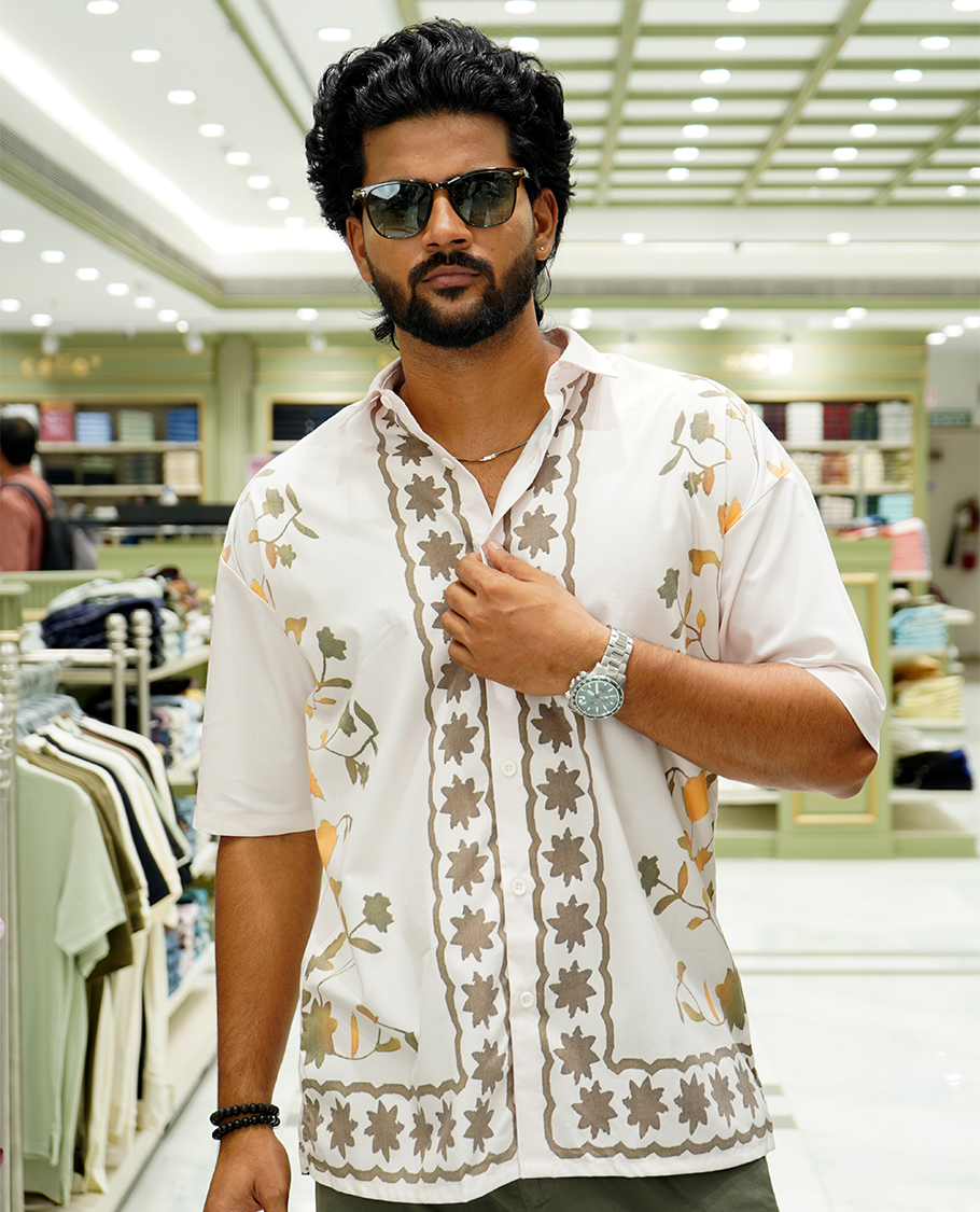 Cream Cotton-Blended Casual Shirt Features Floral Vine Print, Full Sleeves, a Spread Collar, a Slim Fit, and a Regular Length