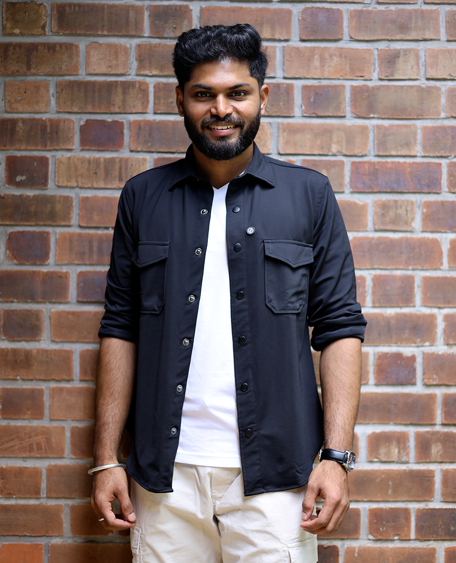 Black Solid Poly-Blended Casual Shirt Featuring Full Sleeves, a Spread Collar, a Slim Fit, and Regular Length