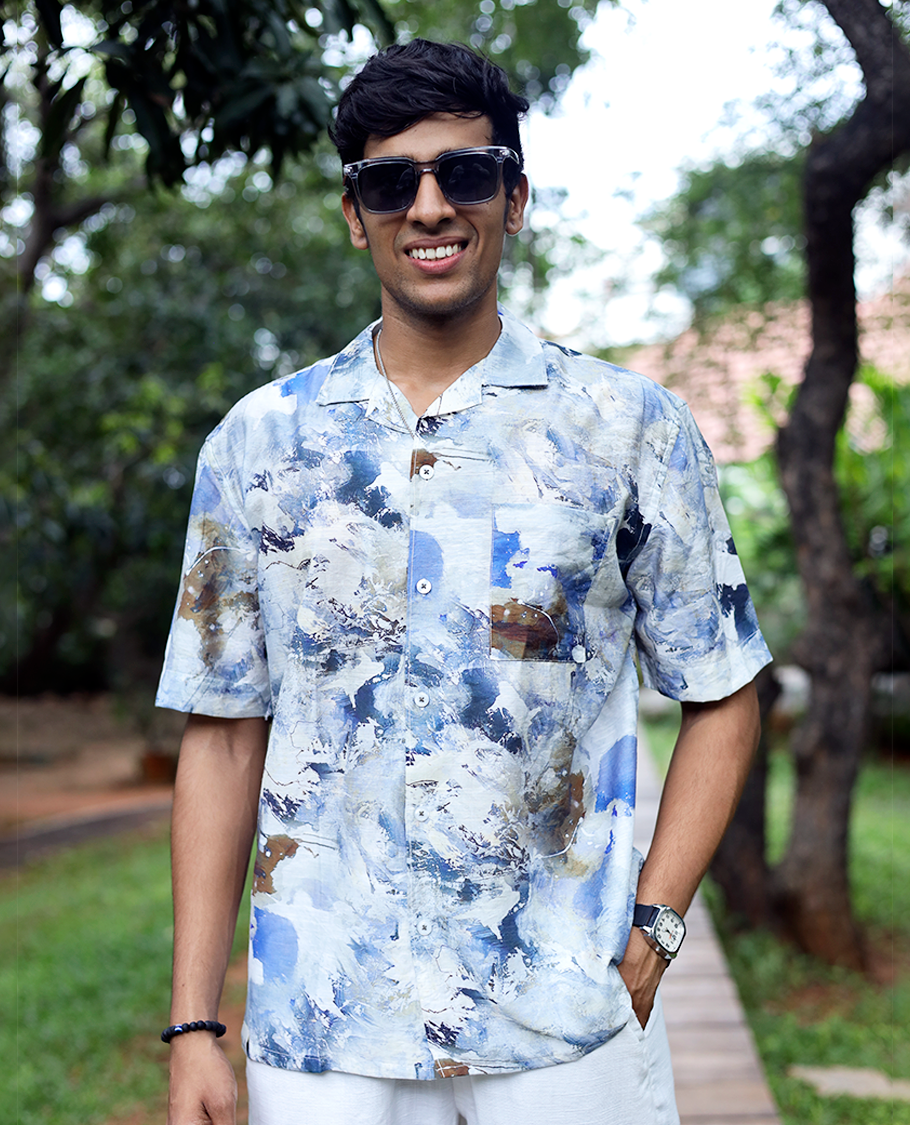 Blue Cotton-Blended Casual Shirt Beautified with Abstract-Painting-Style Print, Half Sleeves, a Regular Fit, a Cuban Collar, and a Regular Length