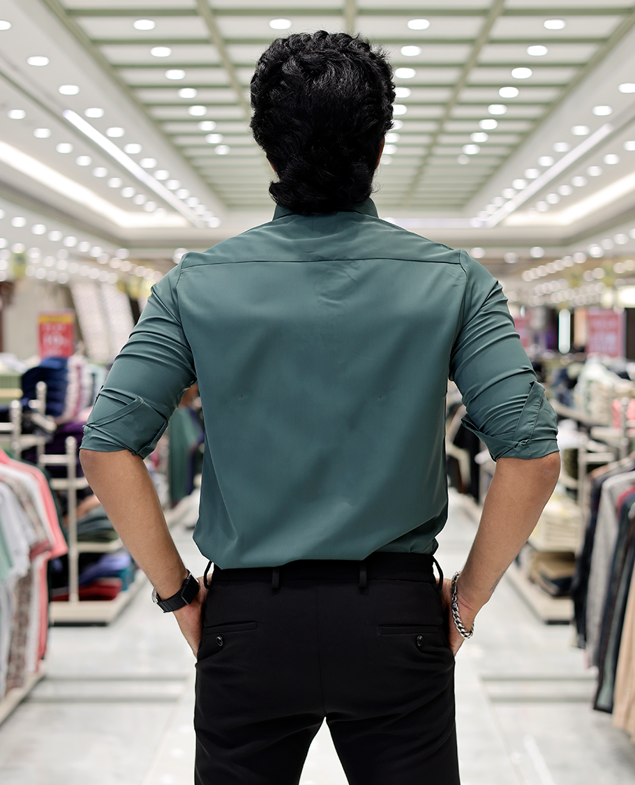 Green Solid Poly-Blended Formal Shirt Features Full Sleeves, a Slim Fit, a Spread Collar, and Regular Length