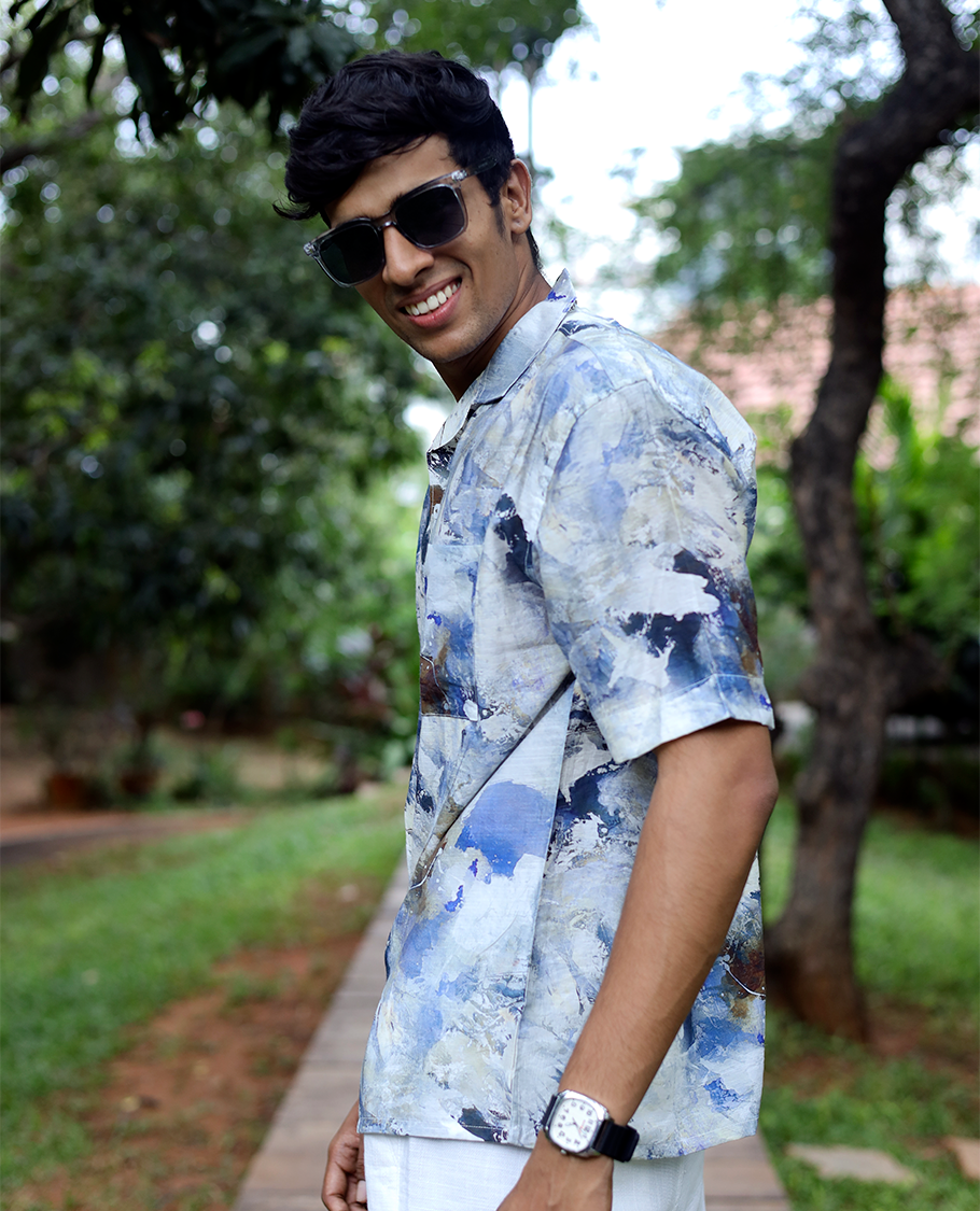 Blue Cotton-Blended Casual Shirt Beautified with Abstract-Painting-Style Print, Half Sleeves, a Regular Fit, a Cuban Collar, and a Regular Length