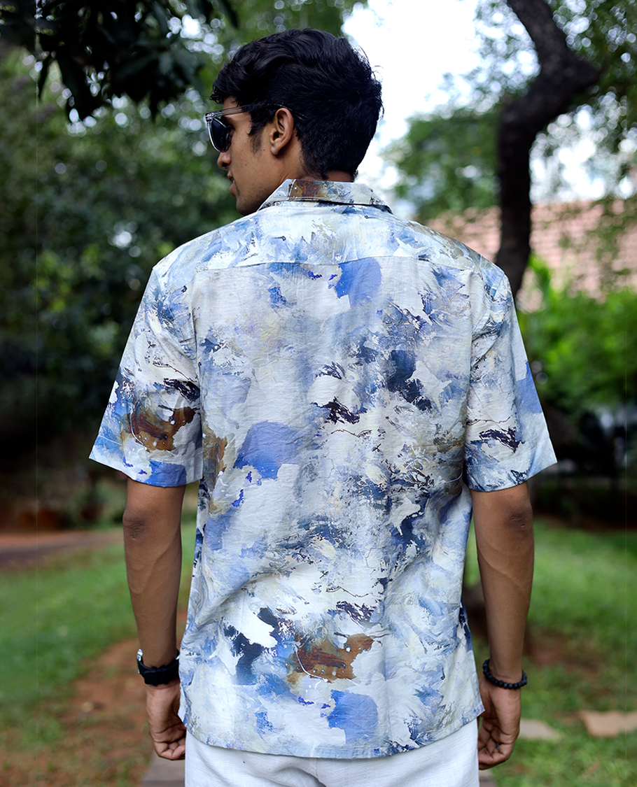 Blue Cotton-Blended Casual Shirt Beautified with Abstract-Painting-Style Print, Half Sleeves, a Regular Fit, a Cuban Collar, and a Regular Length