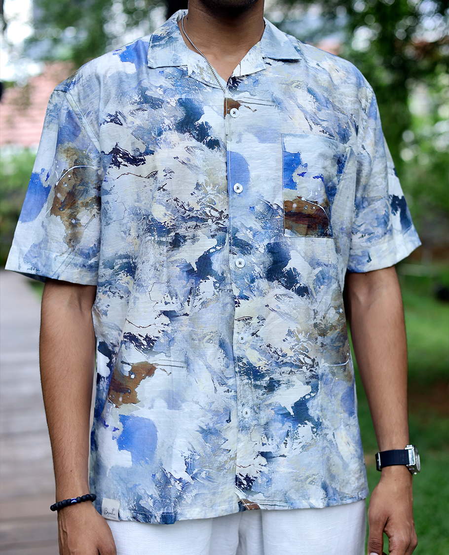 Blue Cotton-Blended Casual Shirt Beautified with Abstract-Painting-Style Print, Half Sleeves, a Regular Fit, a Cuban Collar, and a Regular Length
