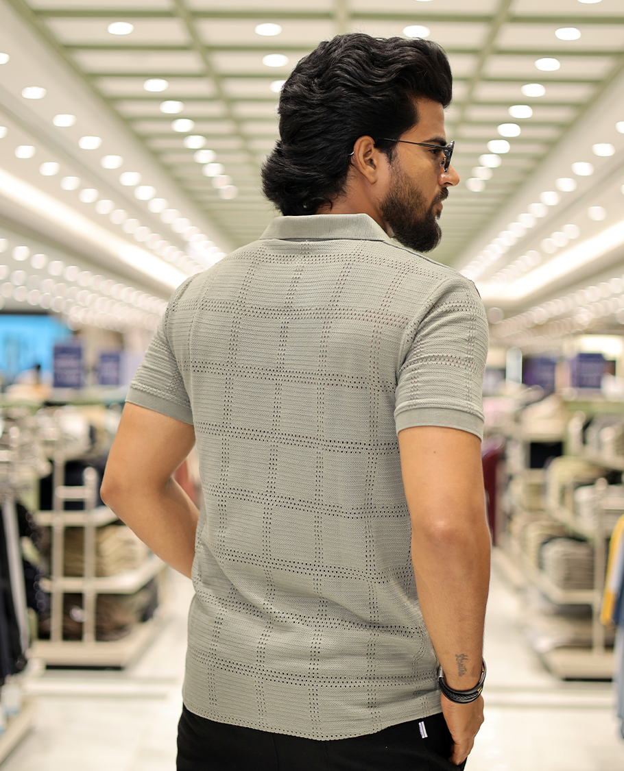 Green Corduroy T-Shirt Comes with a Checked Texture, a Polo Neck, Half-Sleeves, a Slim Fit, and Regular Length