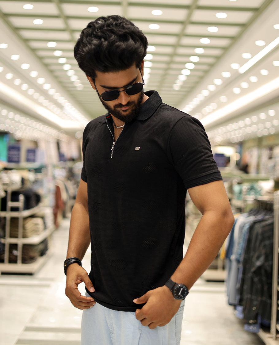 Black Textured Cotton-Blended Laser-Cut T-Shirt Comes with Half-Sleeves, a Polo Neck, a Slim Fit, and Regular Length