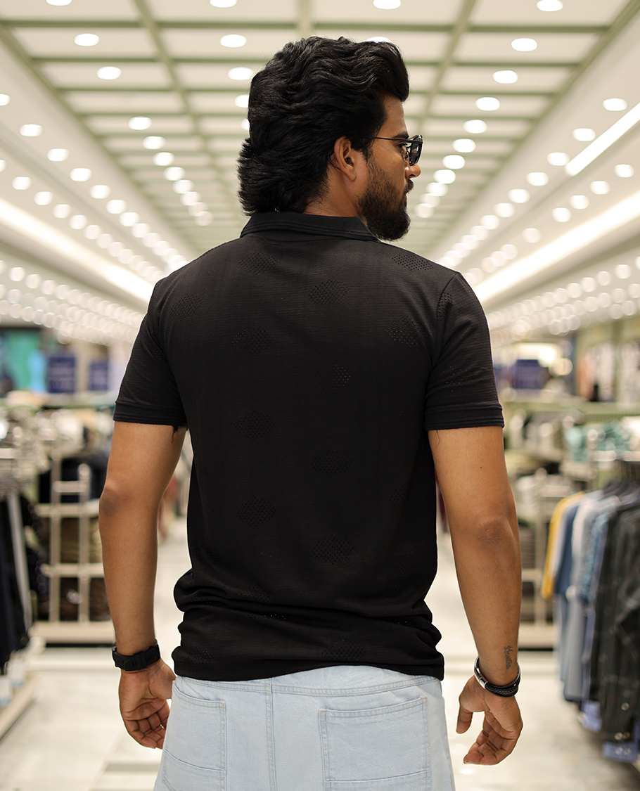 Black Textured Cotton-Blended Laser-Cut T-Shirt Comes with Half-Sleeves, a Polo Neck, a Slim Fit, and Regular Length
