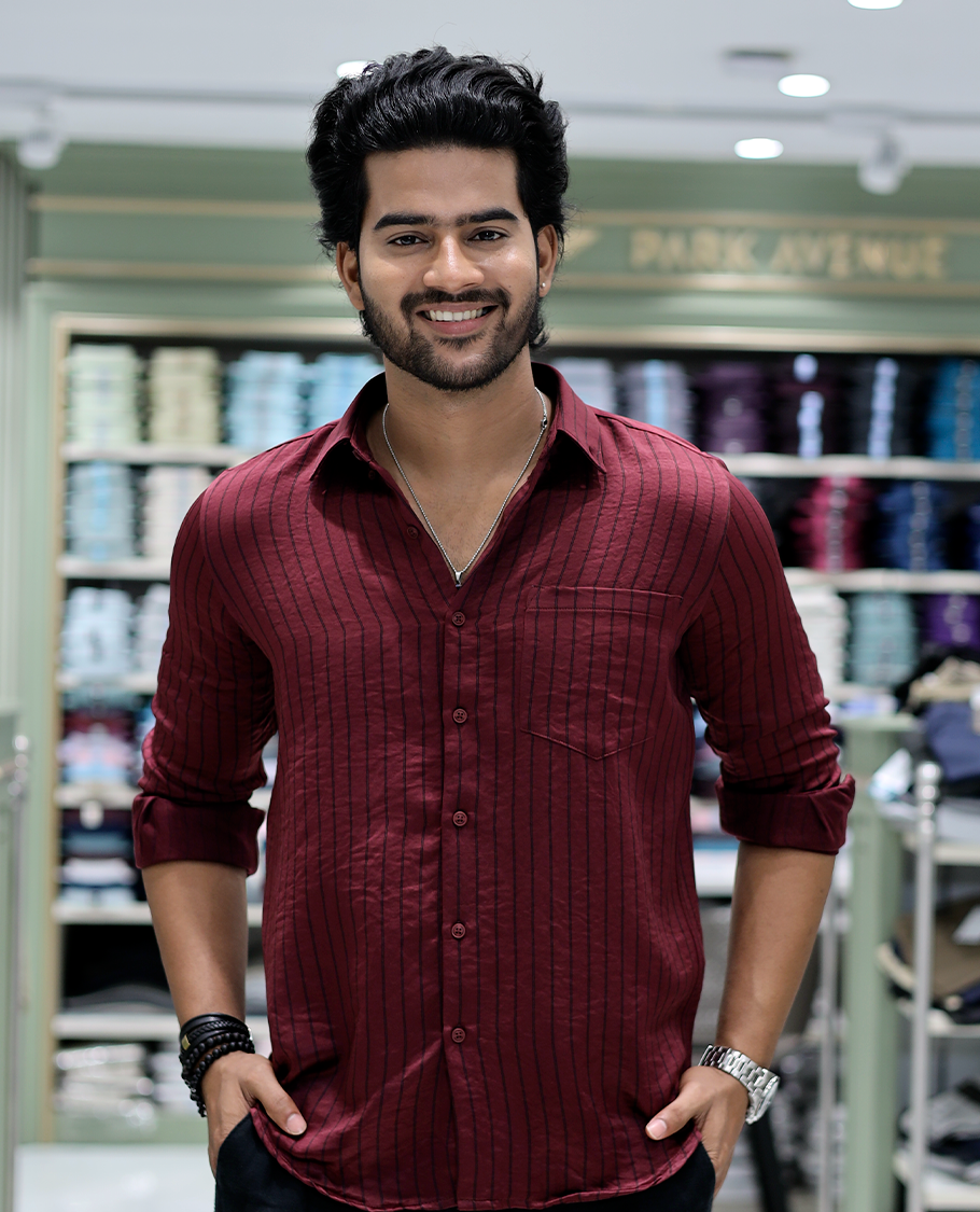 Maroon Striped Poly-Blended Formal Shirt Comes with Full Sleeves, a Spread Collar, a Slim Fit, and a Regular Length