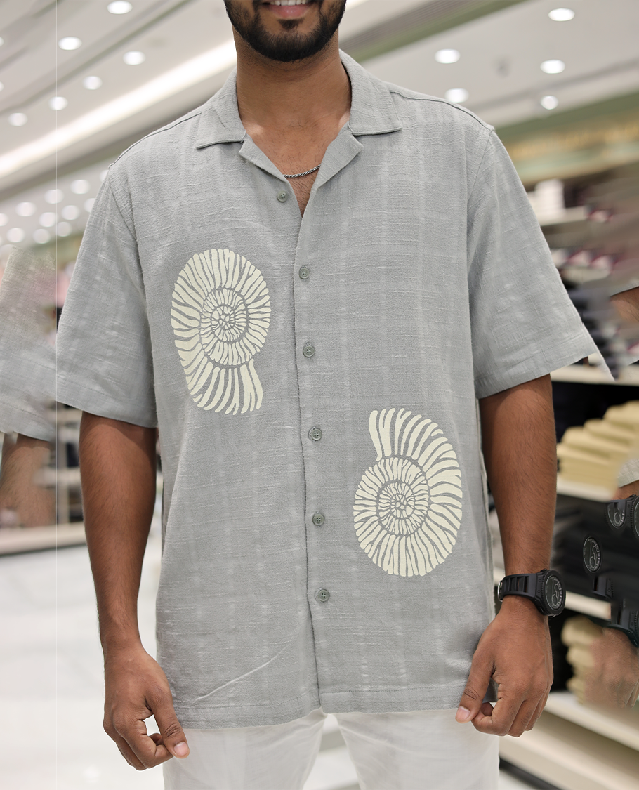 Grey Poly-Blended Causal Shirt, Comes with Shell Motifs Print, Half Sleeves, a Cuban Collar, a Boxy Fit, and Regular Length