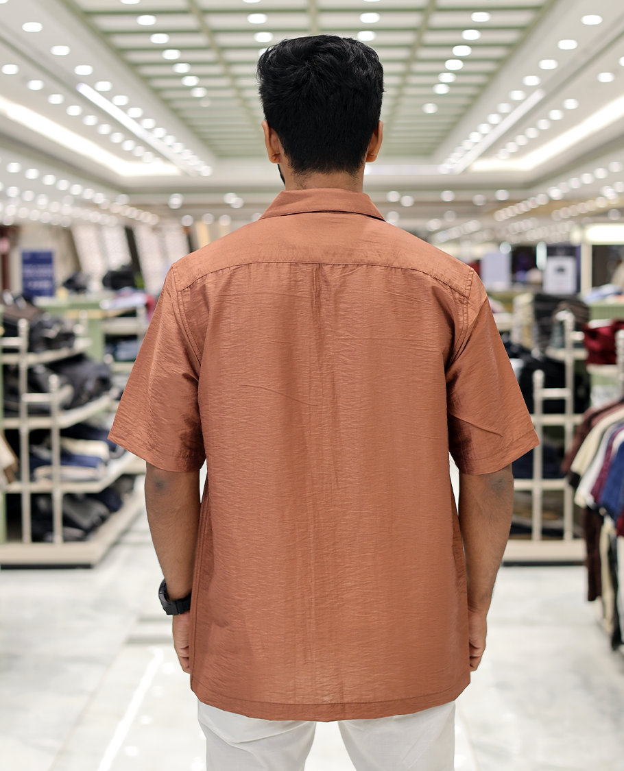 Brown Poly-Blended Causal Shirt, Comes with Fire Motifs Print, Half Sleeves, a Cuban Collar, a Boxy Fit, and Regular Length