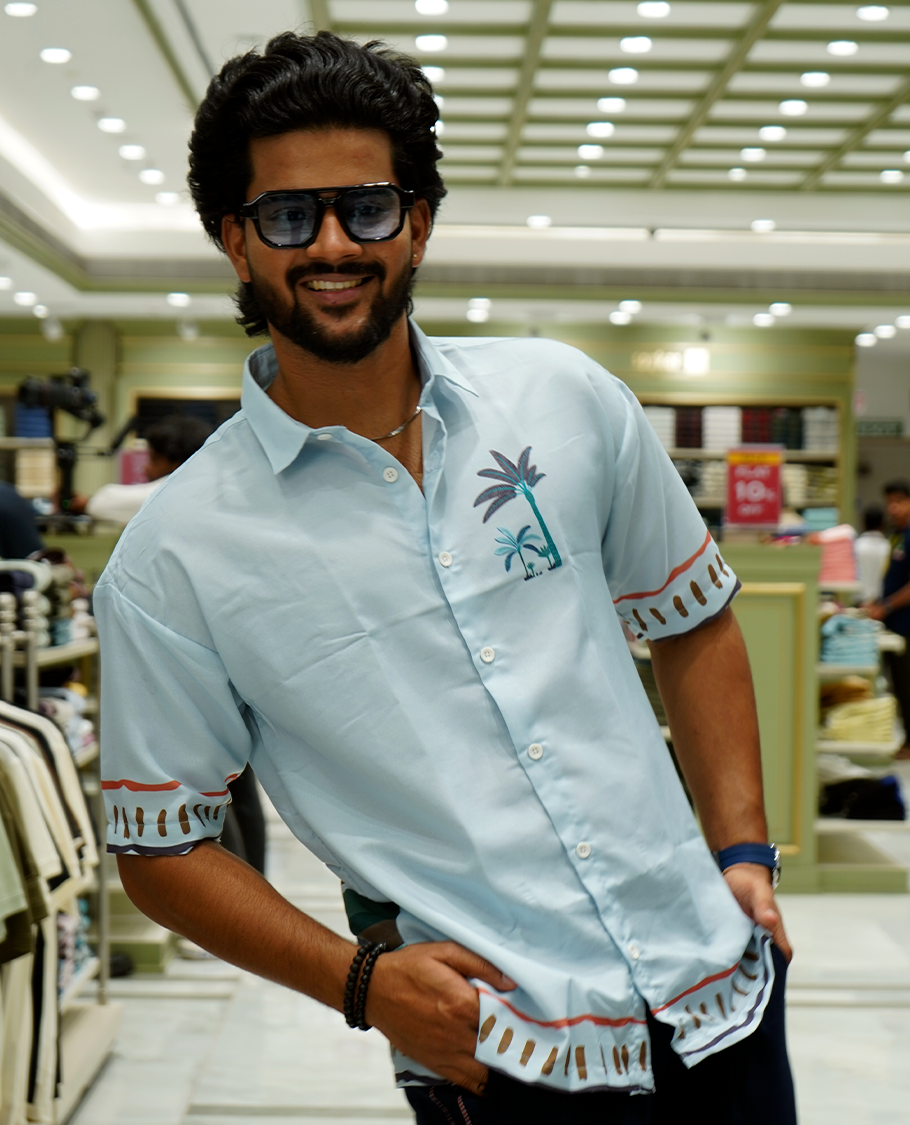 Light Blue Cotton-Blended Casual Shirt Features Tropical Flora Print, Full Sleeves, a Spread Collar, a Slim Fit, and a Regular Length