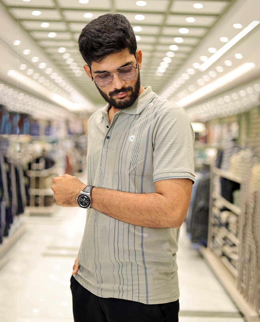 Green Striped Cotton-Blended T-Shirt Comes with Half-Sleeves, a Polo Neck, a Slim Fit, and Regular Length
