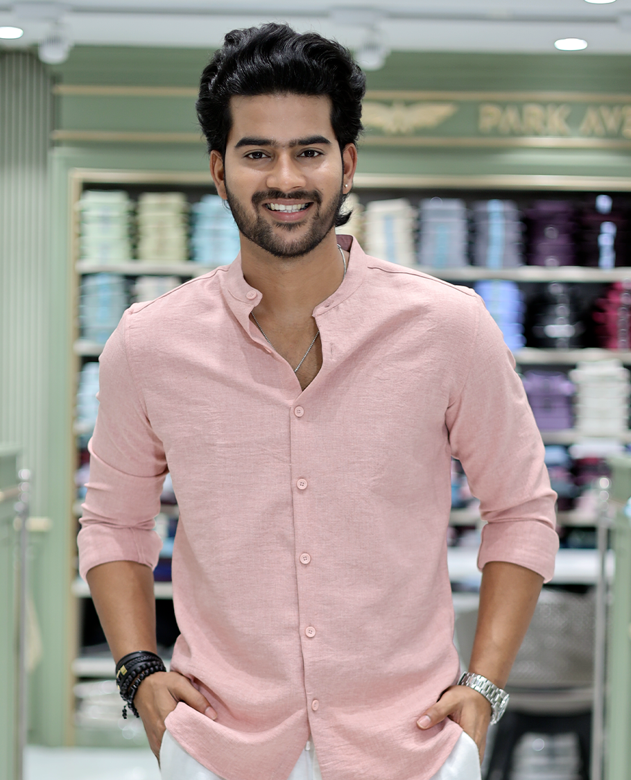 Pastel Pink Solid Cotton-Blended Casual Shirt Comes with Full Sleeves, a Mandarin Collar, a Regular Fit, and a Regular Length