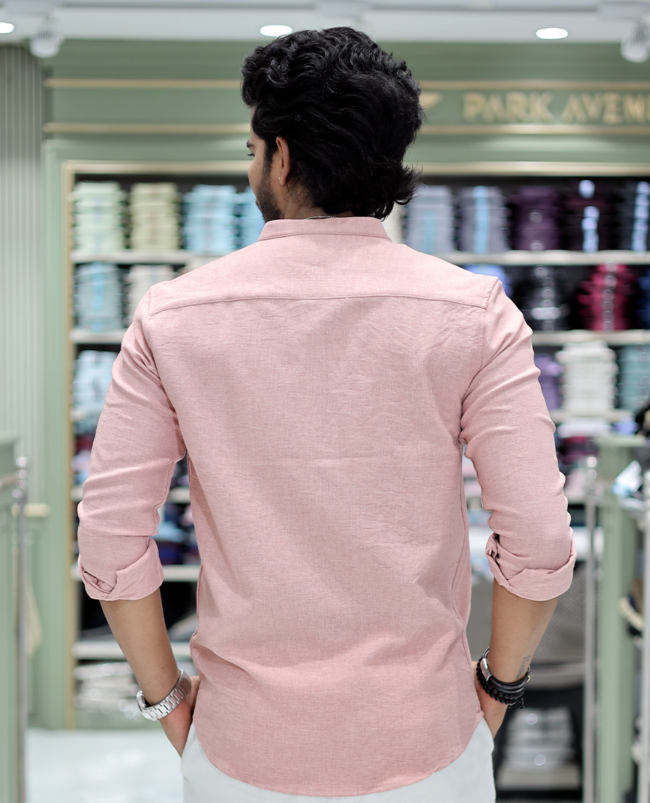 Pastel Pink Solid Cotton-Blended Casual Shirt Comes with Full Sleeves, a Mandarin Collar, a Regular Fit, and a Regular Length