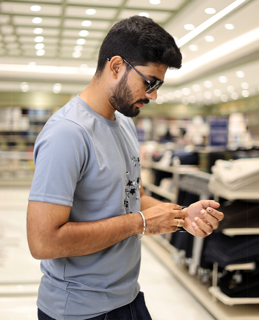 Airforce Blue Cotton-Blended T-Shirt Comes with Floral Embroidered Motifs, Half-Sleeves, a Crew Neck, a Slim Fit, and Regular Length