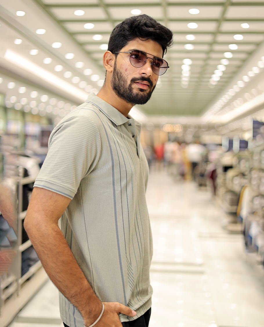 Green Striped Cotton-Blended T-Shirt Comes with Half-Sleeves, a Polo Neck, a Slim Fit, and Regular Length