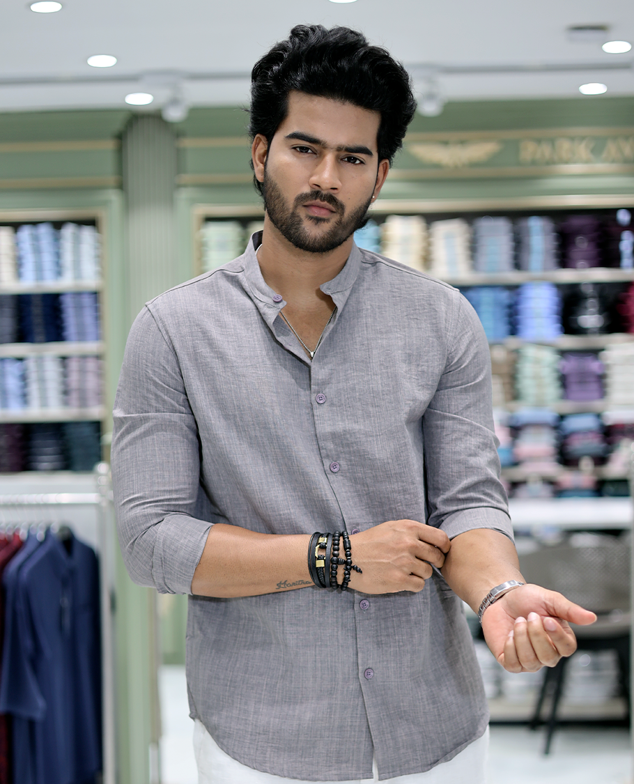 Grey Solid Cotton-Blended Casual Shirt Comes with Full Sleeves, a Mandarin Collar, a Regular Fit, and a Regular Length