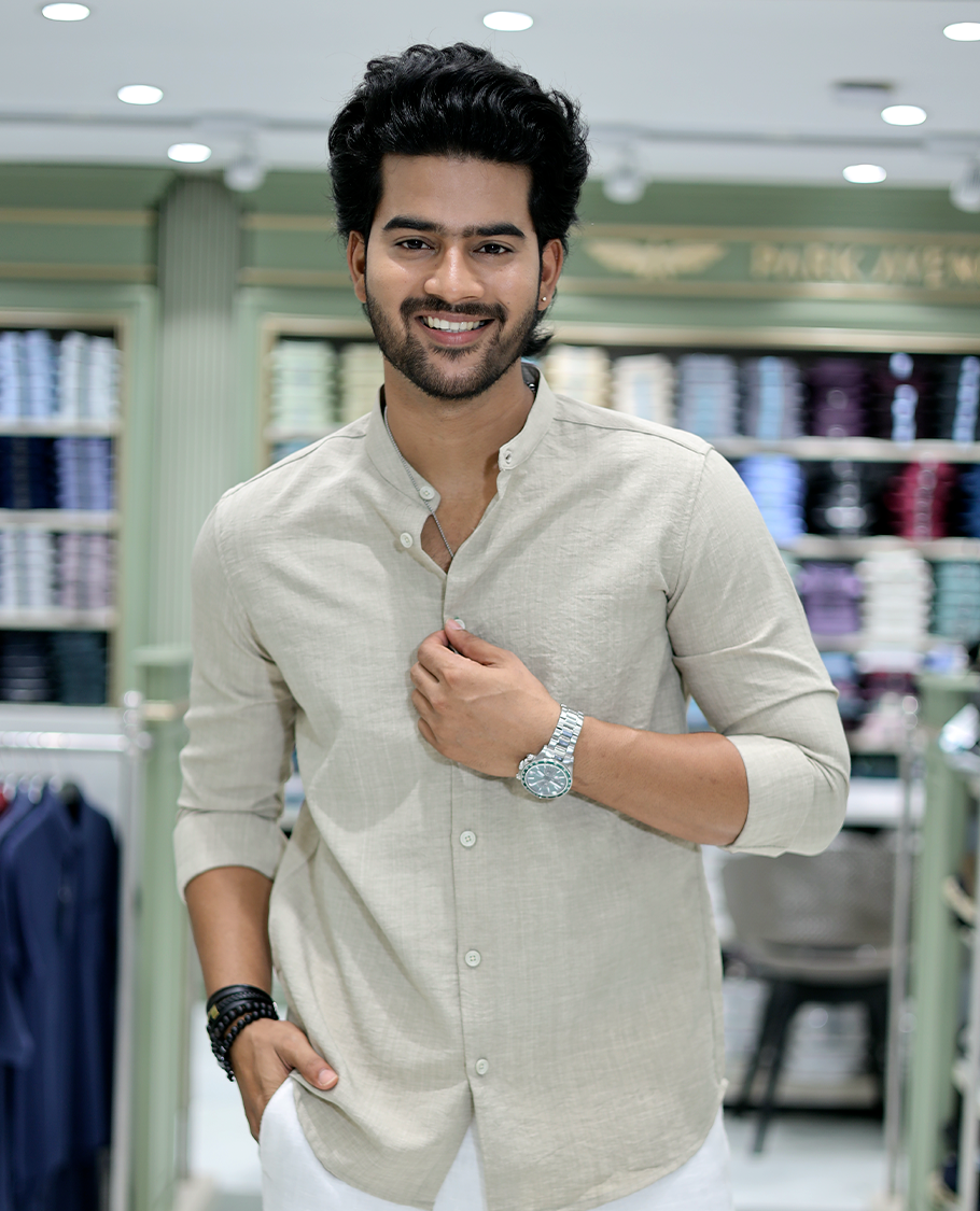 Taupe Solid Cotton-Blended Casual Shirt Comes with Full Sleeves, a Mandarin Collar, a Regular Fit, and a Regular Length