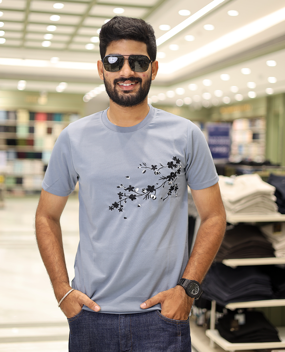 Airforce Blue Cotton-Blended T-Shirt Comes with Floral Embroidered Motifs, Half-Sleeves, a Crew Neck, a Slim Fit, and Regular Length