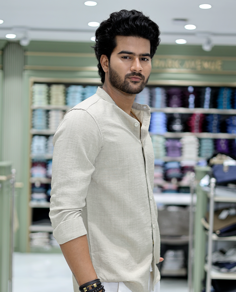 Taupe Solid Cotton-Blended Casual Shirt Comes with Full Sleeves, a Mandarin Collar, a Regular Fit, and a Regular Length