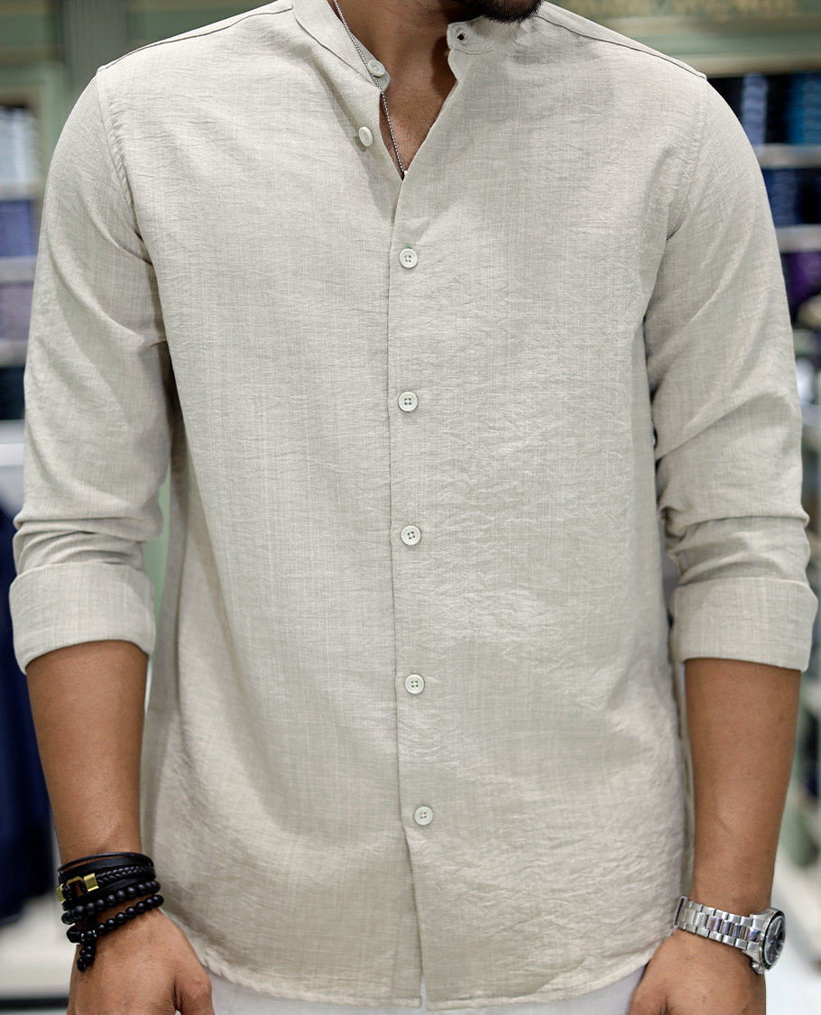 Taupe Solid Cotton-Blended Casual Shirt Comes with Full Sleeves, a Mandarin Collar, a Regular Fit, and a Regular Length