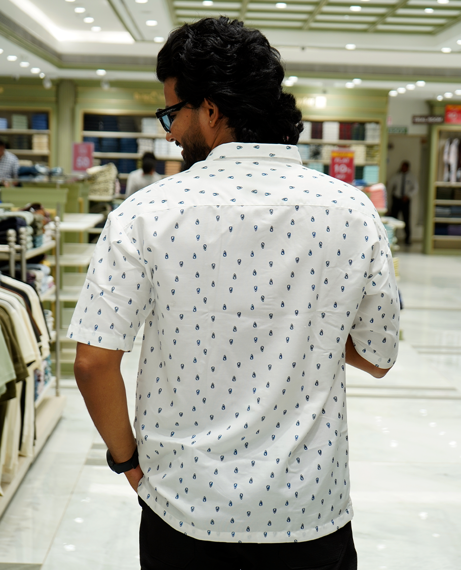 White Cotton-Blended Casual Shirt Features Tropical Floral-Paisley Print, Full Sleeves, a Spread Collar, a Slim Fit, and a Regular Length