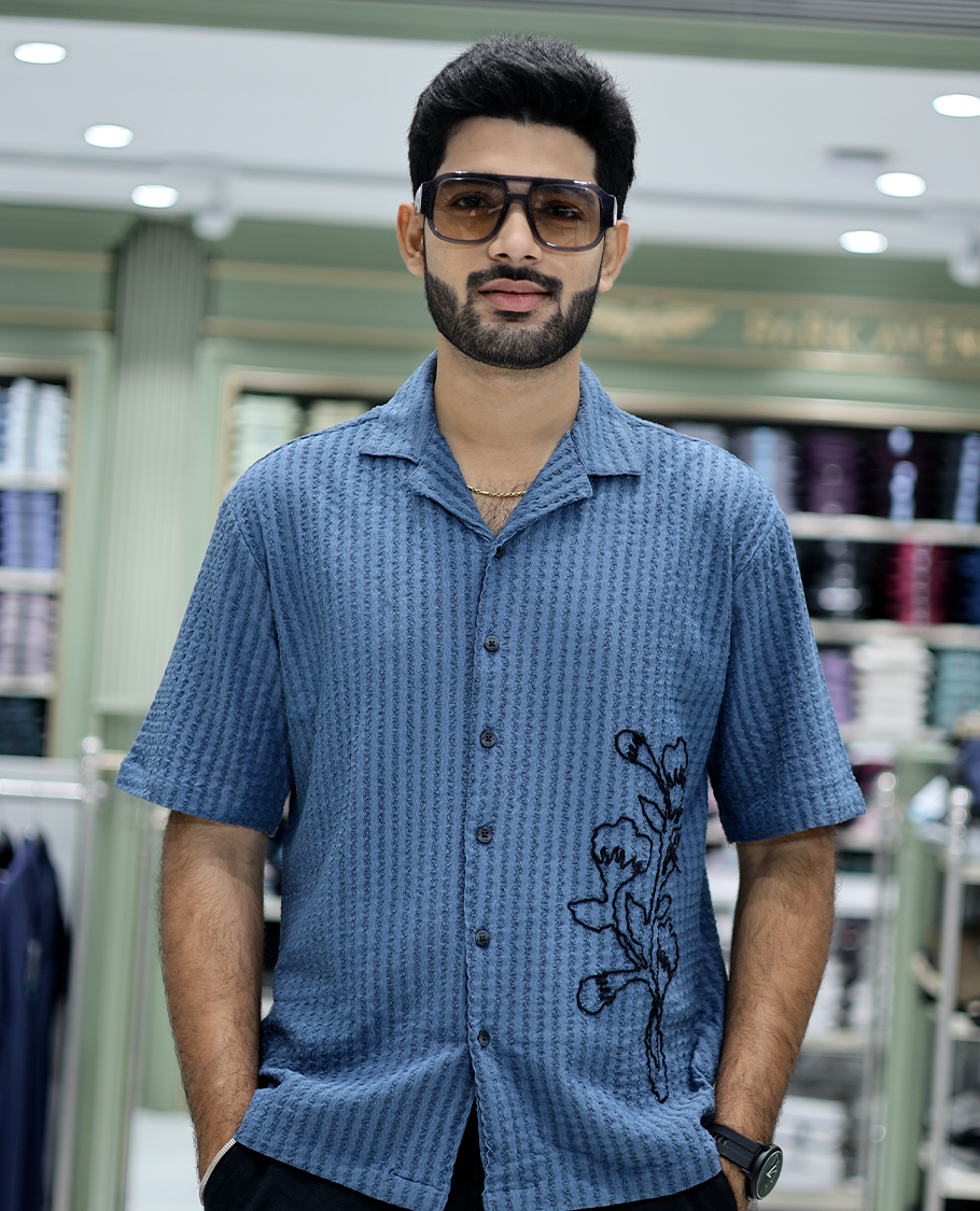 Blue Cotton-Blended Casual Shirt Features Floral Embroidery, Half Sleeves, a Cuban Collar, a Boxy Fit, and a Regular Length