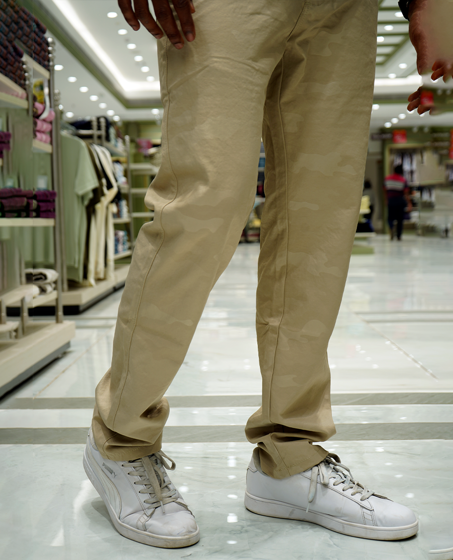 Cream Textured Lycra Traveller Trousers Comes with a Regular Fit and a Regular Length