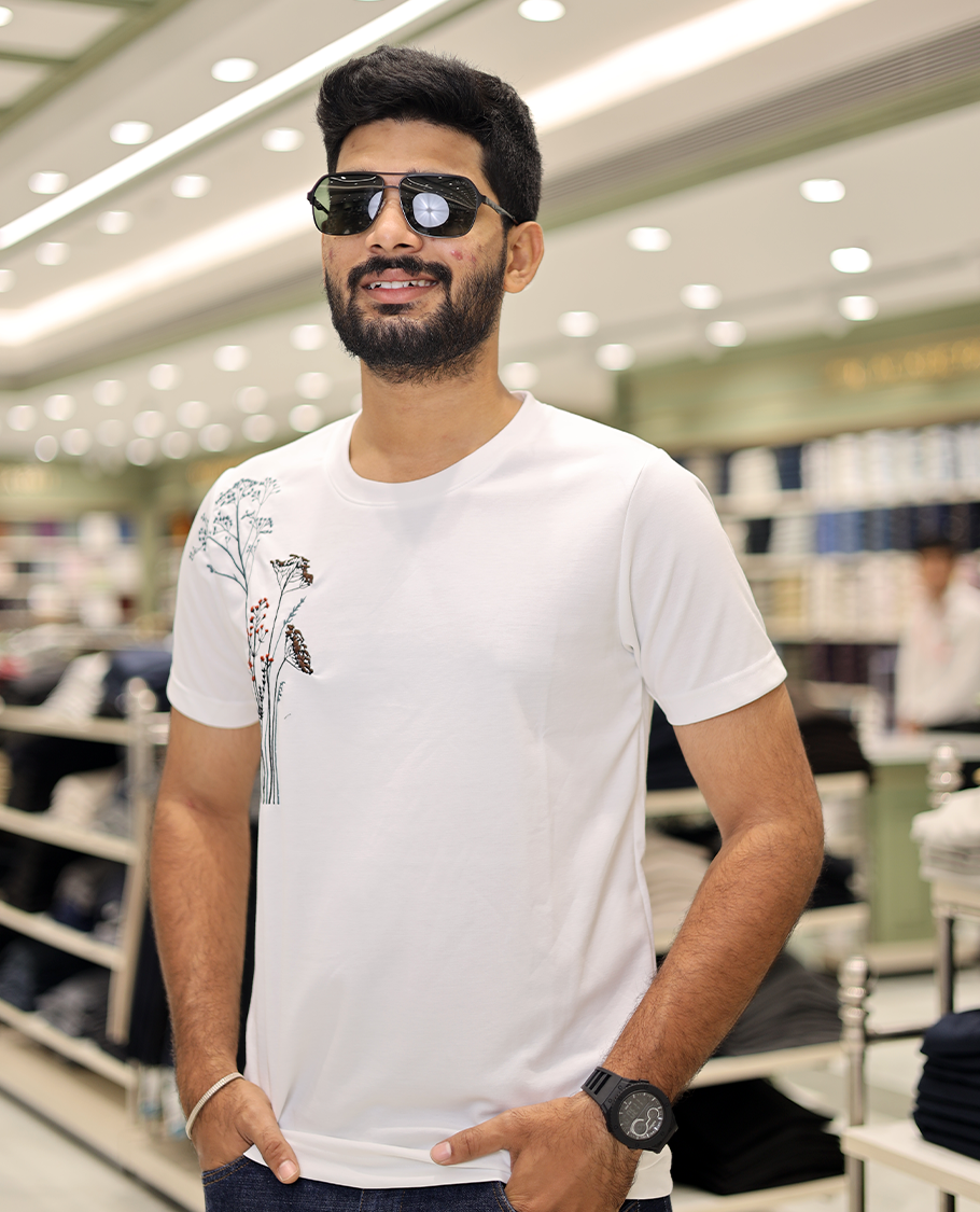 White Cotton-Blended T-Shirt Comes with Floral-Theme Embroidered Motifs, Half-Sleeves, a Crew Neck, a Slim Fit, and Regular Length