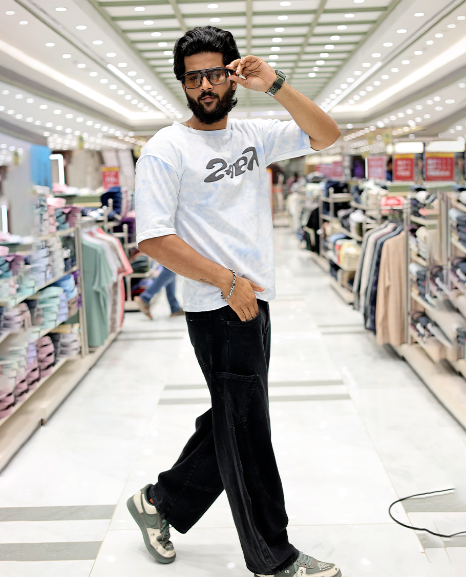 Light Blue Oversized Cotton-Blended T-Shirt Features an Abstract Dyed Typography Print, Half-Sleeves, Crew Neck, and Regular Length